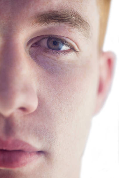 istock Close up of half face 668214910