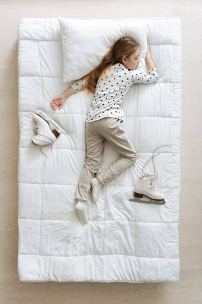 istock Wonderful tired girl falling asleep 668215534