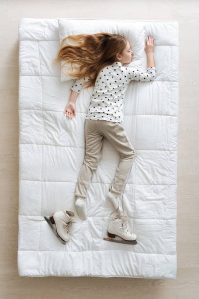 istock Tired cute child imagining her day 668215586