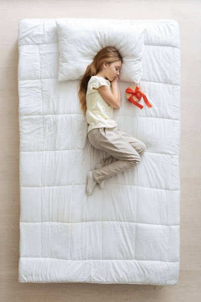 istock Lovely cute girl about discovering present 668218158