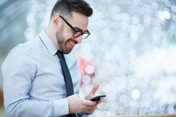 istock Modern Businessman Reading text Message with Good News 668221268