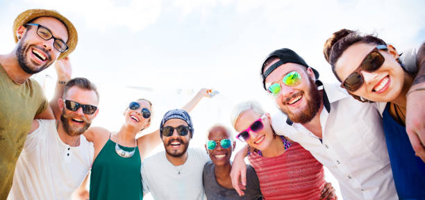 istock Group Of People Hugging Concept 668221990