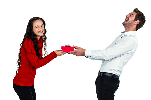 Happy young couple holding gift box on white screen