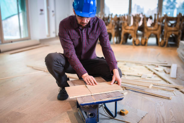 istock Carpenter cutting wooden plank 668224672