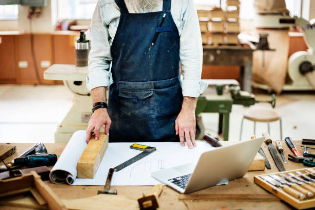 istock Carpenter Craftsman Handicraft Wooden Workshop Concept 668224848