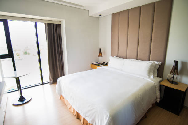 istock Nobody in hotel room with big bed 668224950