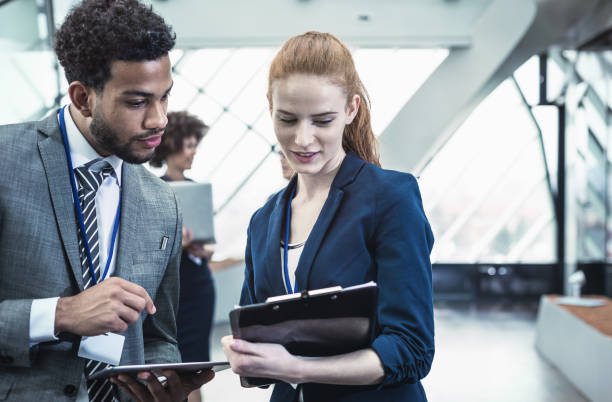 istock Business People at a Conference Event 668225756