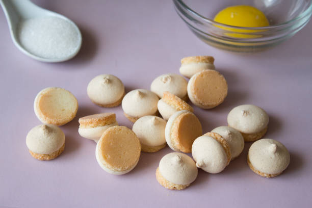 istock Close up of cookies with sugar and egg. Pink background 668239932