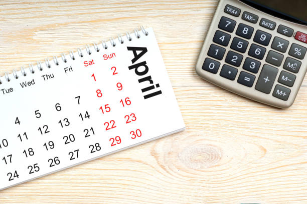 istock april calendar with calculator over office table 668271452