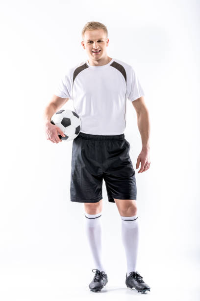 istock Soccer player exercising with ball 668279244