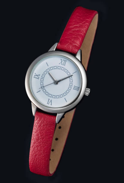 istock woman watch on black background with clipping path 668295946