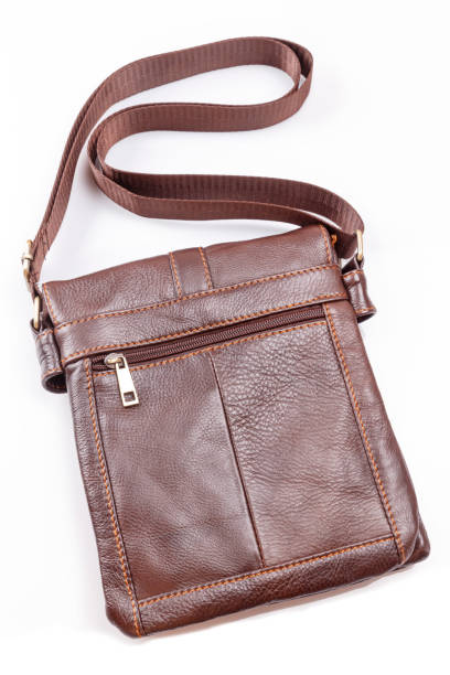 istock Small elegant red men's leather bag shoulder strap,Isolated. 668297266