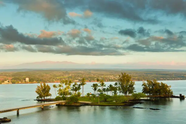 Morning sunrise scene at Coconut Island at the Liliuokalani Park in the city of Hilo on the North east shore of Hawaii Island, or the Big Island. A vibrant small city where the local government located. The Coconut Island is a popular destination for both local residents and tourists.