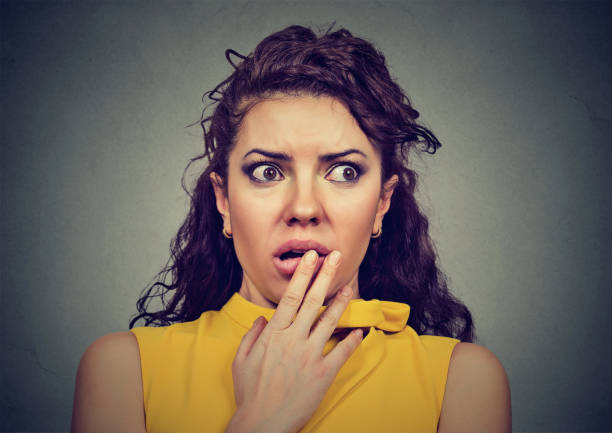 istock Scared shocked woman isolated on gray background 668299862