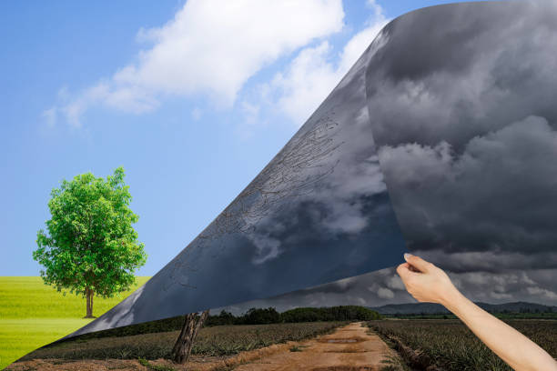 istock Ecology Concept Hand pull The dark sky and the fresh sky 668316742