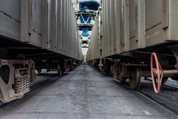 Railway cars waiting for loading in port.