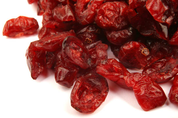 istock Dried cranberries isolated on white background 668329482