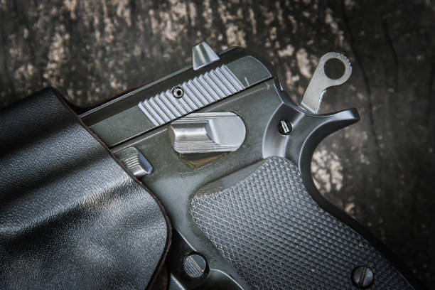 istock handgun in holster 668349960