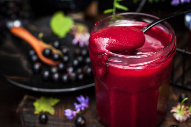 istock Jar of delicious homemade black currant curd 668360004