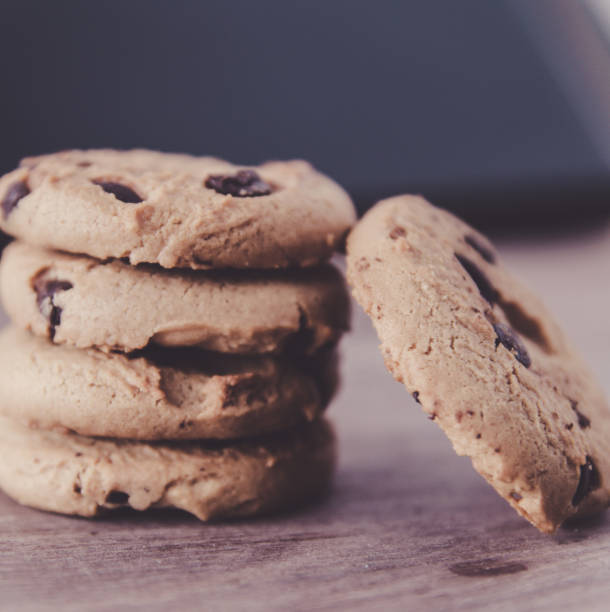 istock Chocolate chip cookies on old wooden table 668371784