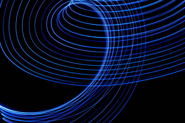 istock Blue Light Painting Photography on a black background 668373832