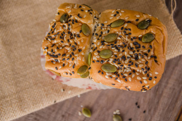 istock fresh bread and wheat on the wooden 668378772
