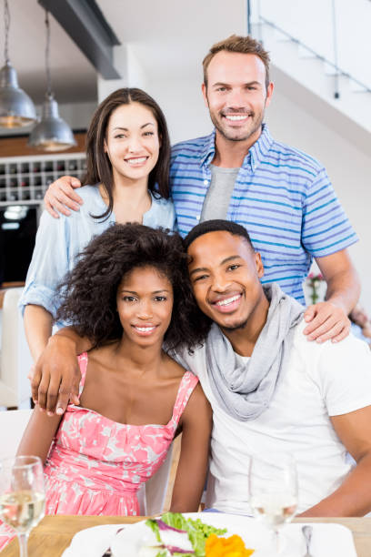 istock Friends looking at camera and smiling 668382694