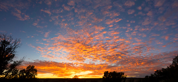 A composite image of a high desert sunset in eastern Arizona. American Southwest.