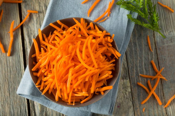 istock Raw Organic Orange Shredded Carrots 668402500