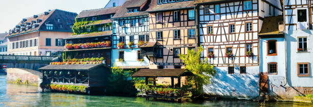 Strasbourg - "petite France" - pictorial part of old  town. Alsace, France Beautiful old part of Strasbourg city with traditional houses. Popular touristic attraction La Petite France stock pictures, royalty-free photos & images