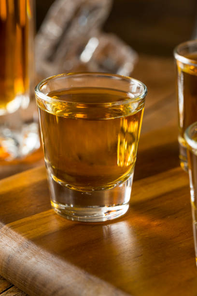 istock Group of Bourbon Whiskey Shots 668403026