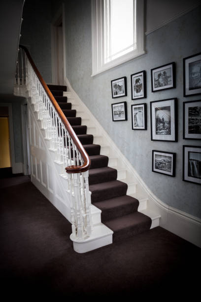 istock Hall and stairs of a victorian home 668405714