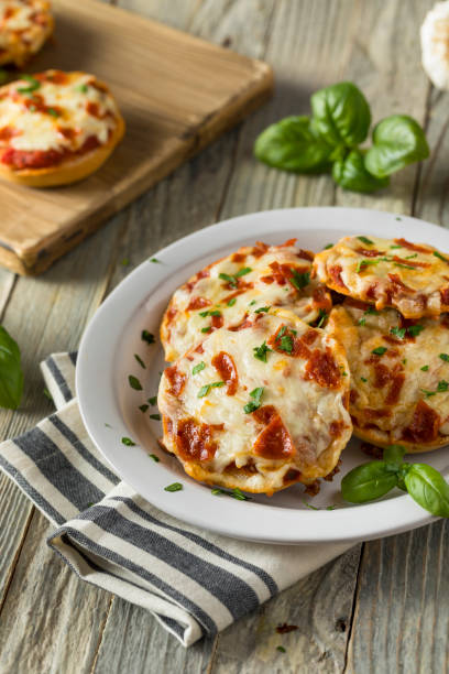 istock Homemade Pepperoni Mini Pizza Bagels 668405810