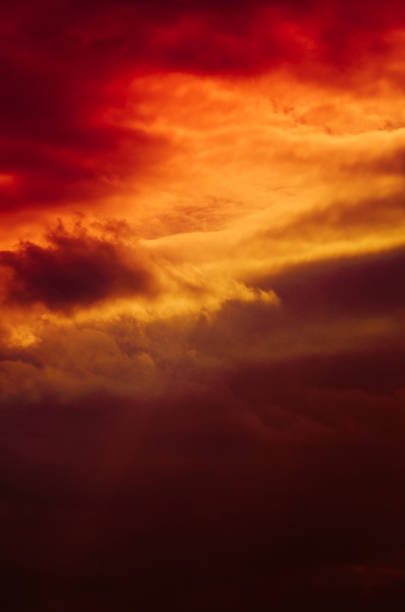 istock red sunset Fantasy sky, thick clouds before the rain 668406800