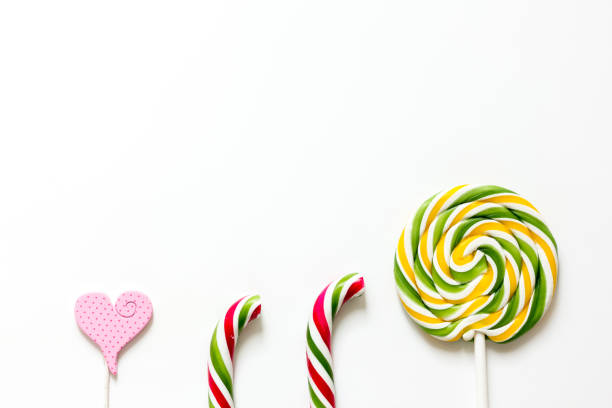 istock Colorful candies on white background top view mock up 668406830