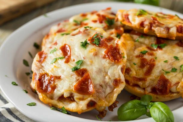 istock Homemade Pepperoni Mini Pizza Bagels 668409830