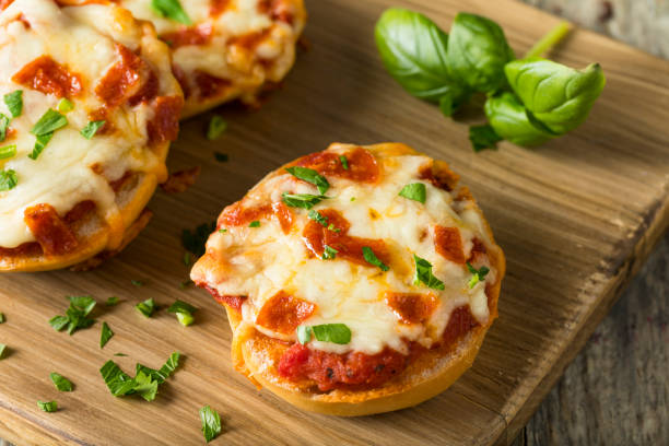 istock Homemade Pepperoni Mini Pizza Bagels 668409904