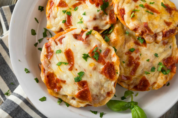 istock Homemade Pepperoni Mini Pizza Bagels 668410156