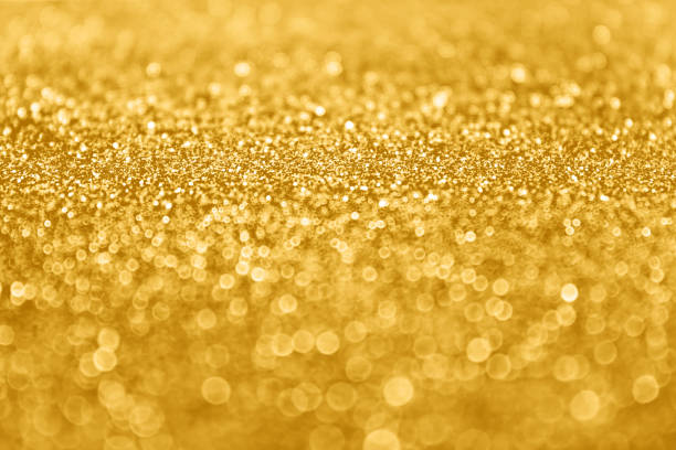 Abstract Gold Glitter Sequin Sparkle Background Abstract gold glitter sparkle confetti background or golden party invite for happy birthday, 50th anniversary backdrop, New Year’s Eve ad, fashion sequins, Christmas bokeh, engagement or bridal design 50th anniversary photos stock pictures, royalty-free photos & images