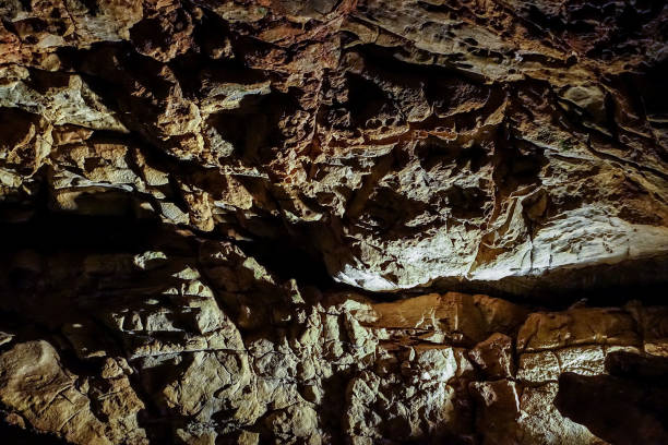 istock Fantastic stalactite caves and wall relief. 668419780