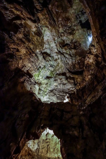 istock Fantastic stalactite caves and wall relief. 668425700