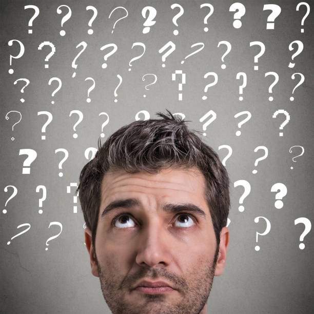istock Confused curious man thinking looking up has many questions and no answer 668426958