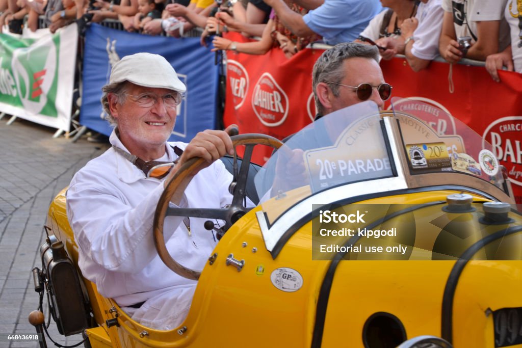 LE MANS, FRANCE - JUNE 13, 2014:Parade of pilots racing.Presentation of Morgan Darmont car. LE MANS, FRANCE - JUNE 13, 2014:Parade of pilots racing.Presentation of Morgan Darmont car in Le Mans, France. 24 Heures du Mans Stock Photo