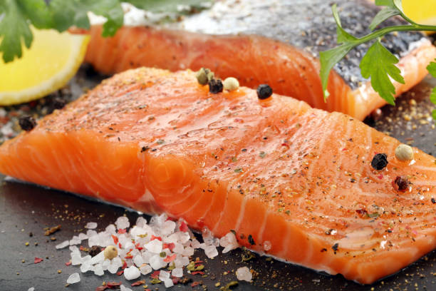 istock with herbs and spices ready for baking on stone 668442882