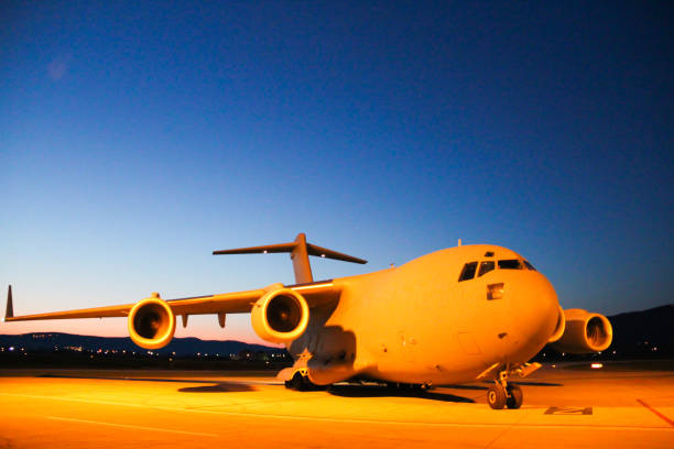 Passenger plane on airport at night