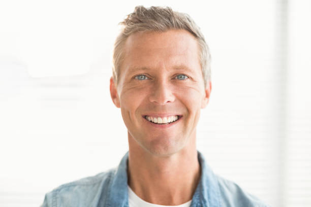 istock Smiling businessman looking at the camera 668447080