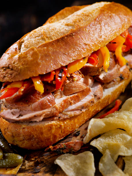 istock Roast Pork Sandwich with Roasted Peppers 668450252