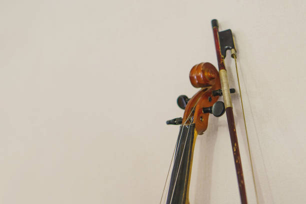 old violin detail on paper with copy-space