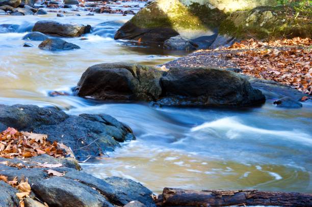 istock Autumn Streams and Waterfalls 668453594