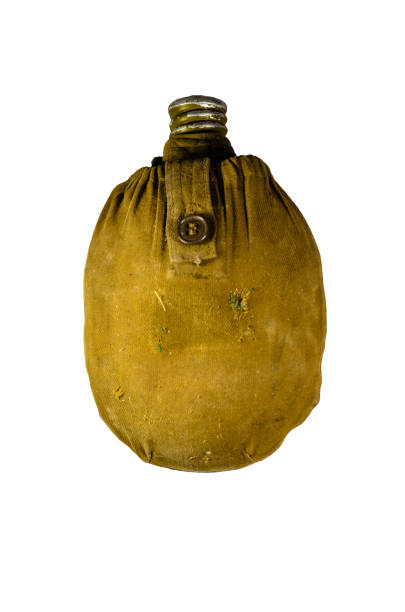 army flask in rag cover isolated on white background - water bottle survival military bottle imagens e fotografias de stock